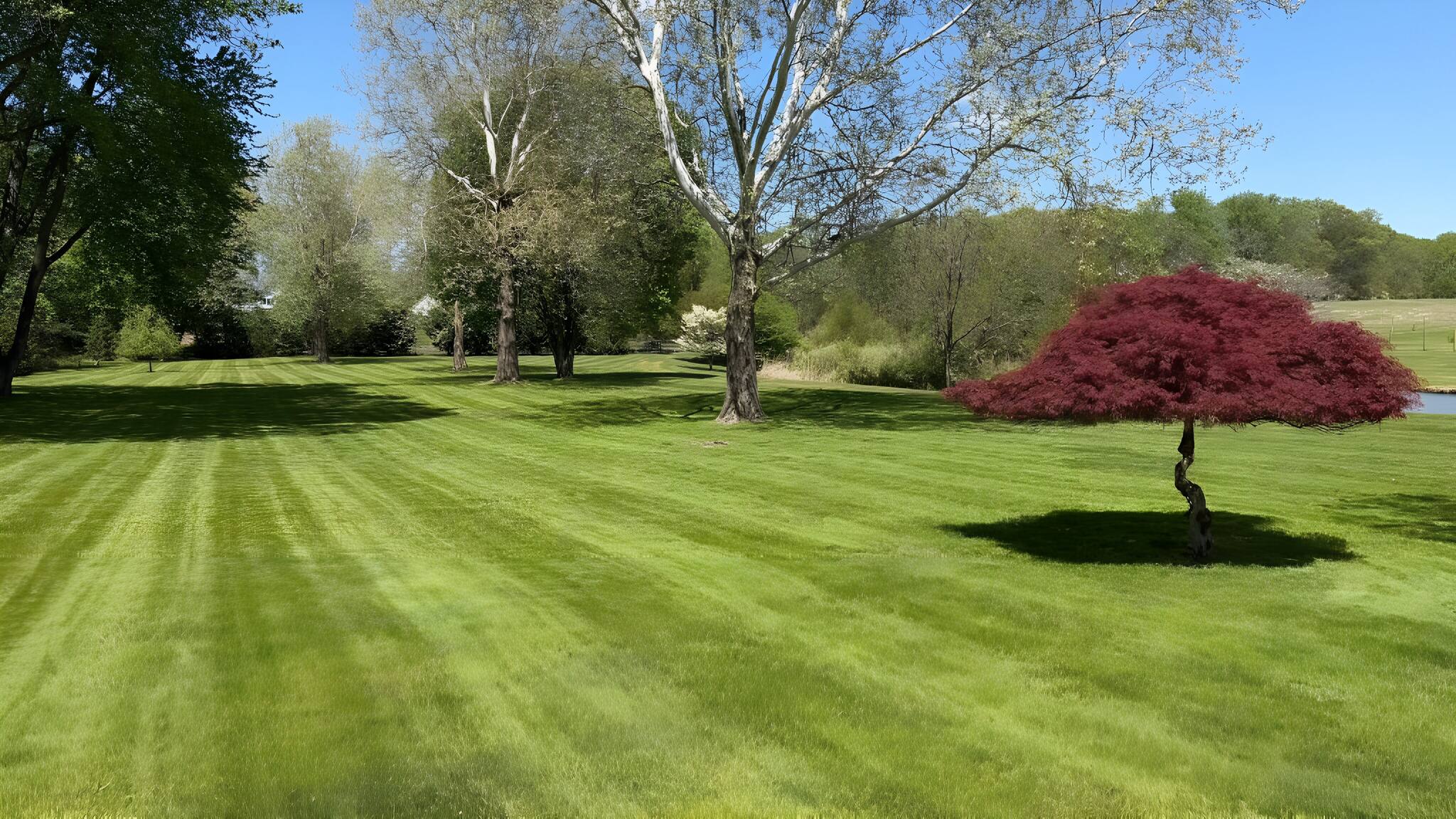 Manicured striped lawn at 17 Windsor Estate — luxury waterfront film location New Jersey